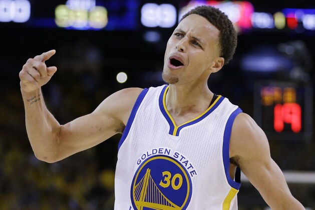 Golden State Warriors guard Stephen Curry (30) celebrates during the second half of Game 5 of basketball's NBA Finals against the Cleveland Cavaliers in Oakland, Calif., Sunday, June 14, 2015. The Warriors won 104-91. (AP Photo/Ben Margot)
