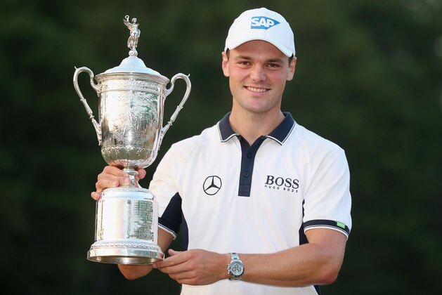 PINEHURST, NC - JUNE 15:  Martin Kaymer of Germany celebrates with the trophy after his eight-stroke victory during the final round of the 114th U.S. Open at Pinehurst Resort & Country Club, Course No. 2 on June 15, 2014 in Pinehurst, North Carolina.  (Photo by Andrew Redington/Getty Images)