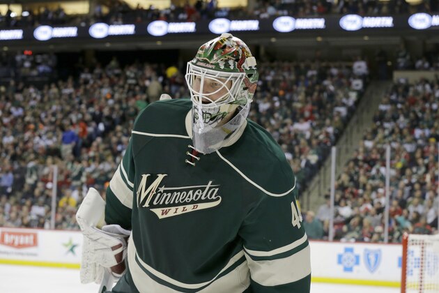 Minnesota Wild goalie Devan Dubnyk (40) skates around during the second period of Game 4 of an NHL hockey first-round playoff series game against the St. Louis Blues in St. Paul, Minn., Wednesday, April 22, 2015. (AP Photo/Ann Heisenfelt)