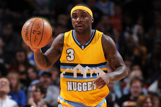 DENVER, CO - APRIL 12:  Ty Lawson #3 of the Denver Nuggets handles the ball against the Sacramento Kings on April 12, 2015 at the Pepsi Center in Denver, Colorado. NOTE TO USER: User expressly acknowledges and agrees that, by downloading and/or using this Photograph, user is consenting to the terms and conditions of the Getty Images License Agreement. Mandatory Copyright Notice: Copyright 2015 NBAE (Photo by Garrett W. Ellwood/NBAE via Getty Images)
