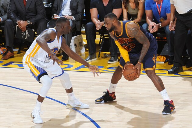 OAKLAND, CA - JUNE 14:  LeBron James #23 of the Cleveland Cavaliers handles the ball against the Golden State Warriors in Game Five of the 2015 NBA Finals on June 14, 2015 at Oracle Arena in Oakland, California. NOTE TO USER: User expressly acknowledges and agrees that, by downloading and or using this photograph, user is consenting to the terms and conditions of Getty Images License Agreement. Mandatory Copyright Notice: Copyright 2015 NBAE (Photo by Noah Graham/NBAE via Getty Images)