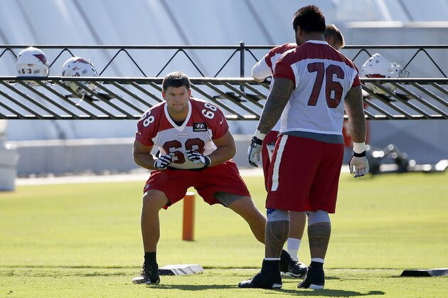 Arizona Cardinals offensive lineman Jared Veldheer (68) works on technique as Mike Iupati (76) looks on during an NFL football organized team activity Monday, June 1, 2015, in Tempe, Ariz. (AP Photo/Ross D. Franklin)