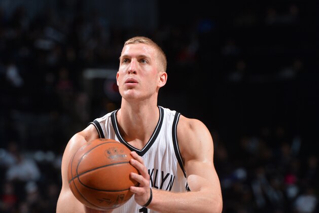 BROOKLYN,NY - APRIL 6: Mason Plumlee #1 of the Brooklyn Nets shoots a foul shot against the Portland Trail Blazers at Barclays Center on April 6, 2015 in Brooklyn, New York NOTE TO USER: User expressly acknowledges and agrees that, by downloading and/or using this Photograph, user is consenting to the terms and conditions of the Getty Images License Agreement. Mandatory Copyright Notice: Copyright 2015 NBAE (Photo by Jesse D. Garrabrant/NBAE via Getty Images)
