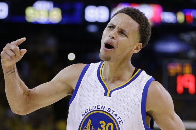 Golden State Warriors guard Stephen Curry (30) celebrates during the second half of Game 5 of basketball's NBA Finals against the Cleveland Cavaliers in Oakland, Calif., Sunday, June 14, 2015. The Warriors won 104-91. (AP Photo/Ben Margot)
