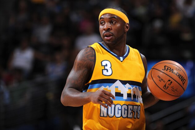 DENVER, CO - APRIL 12:  Ty Lawson #3 of the Denver Nuggets handles the ball against the Sacramento Kings on April 12, 2015 at the Pepsi Center in Denver, Colorado. NOTE TO USER: User expressly acknowledges and agrees that, by downloading and/or using this Photograph, user is consenting to the terms and conditions of the Getty Images License Agreement. Mandatory Copyright Notice: Copyright 2015 NBAE (Photo by Garrett W. Ellwood/NBAE via Getty Images)