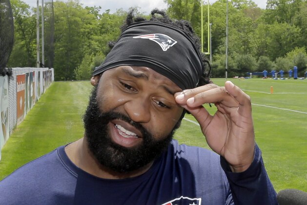 New England Patriots linebacker Brandon Spikes talks with reporters after an NFL football organized team activity Friday, May 29, 2015, in Foxborough, Mass. (AP Photo/Elise Amendola)