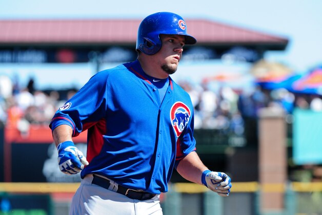 Mar 5, 2015; Scottsdale, AZ, USA; Chicago Cubs catcher Kyle Schwarber (74) rounds third base after hitting a grand slam home run in the second inning against the San Francisco Giants during a spring training baseball game at Scottsdale Stadium. Mandatory Credit: Matt Kartozian-USA TODAY Sports