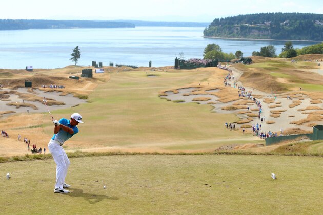 UNIVERSITY PLACE, WA - JUNE 15: Rickie Fowler of the United States hits a tee shot during a practice round prior to the start of the 115th U.S. Open Championship at Chambers Bay on June 15, 2015 in University Place, Washington.  (Photo by Andrew Redington/Getty Images)