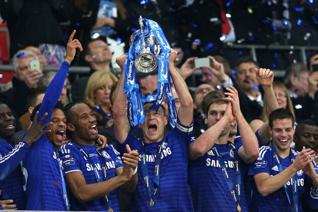 LONDON, ENGLAND - MARCH 01:  Captain John Terry lifts the trophy during the Capital One Cup Final match between Chelsea and Tottenham Hotspur at Wembley Stadium on March 1, 2015 in London, England.  (Photo by Clive Mason/Getty Images)