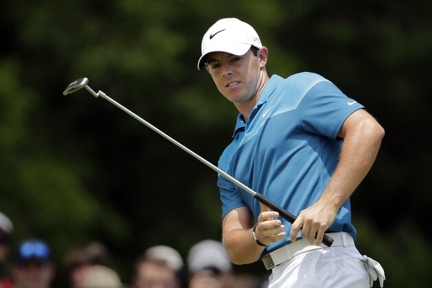Rory McIlroy, of Northern Ireland, reacts as he misses a putt on the second hole during the final round of the Wells Fargo Championship golf tournament at Quail Hollow Club in Charlotte, N.C., Sunday, May 17, 2015. (AP Photo/Chuck Burton)