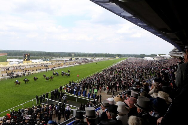 ASCOT, ENGLAND - JUNE 16: Buratino ridden by jockey William Buick (L) wins the Coventry Stakes race during Royal Ascot 2015 at Ascot racecourse on June 16, 2015 in Ascot, England.  (Photo by Charlie Crowhurst/Getty Images for Ascot Racecourse)