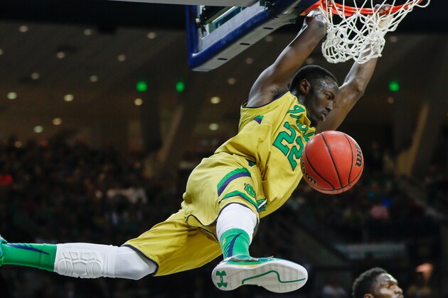 SOUTH BEND, IN - MARCH 07: Jerian Grant #22 of the Notre Dame Fighting Irish dunks the ball against the Clemson Tigers at Purcell Pavilion on March 7, 2015 in South Bend, Indiana. Notre Dame defeated Clemson 81-67. (Photo by Michael Hickey/Getty Images)