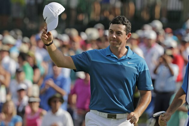 Rory McIlroy, of Northern Ireland, reacts after winning the Wells Fargo Championship golf tournament at Quail Hollow Club in Charlotte, N.C., Sunday, May 17, 2015. (AP Photo/Chuck Burton)