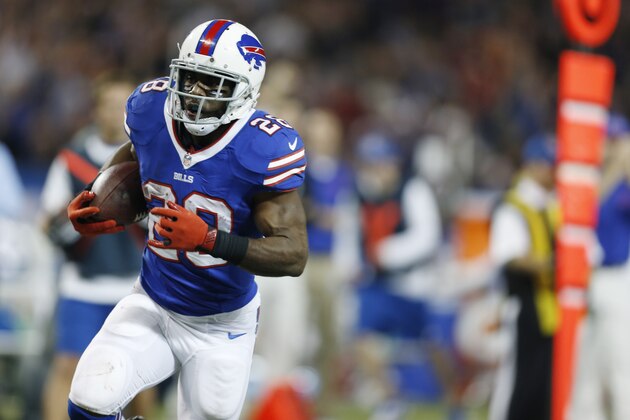 Buffalo Bills running back C.J. Spiller (28) runs for a touchdown against the Atlanta Falcons during the second half of an NFL football game on Sunday, Dec. 1, 2013, in Toronto. (AP Photo/Gary Wiepert)