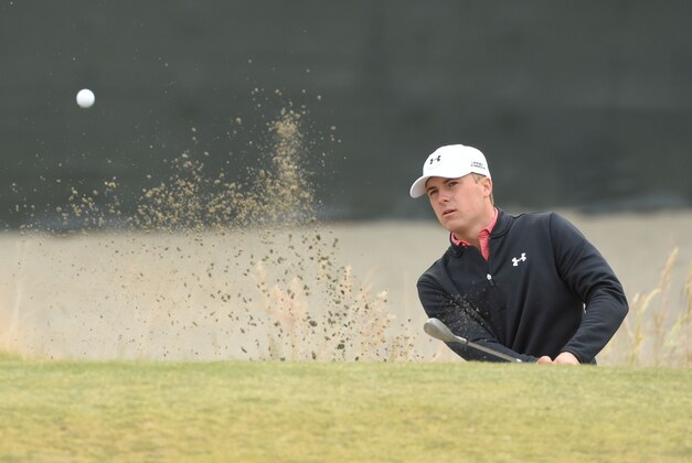 Jun 16, 2015; University Place, WA, USA; Jordan Spieth hits out of the bunker on the ninth hole during practice rounds on Tuesday at Chambers Bay. Mandatory Credit: John David Mercer-USA TODAY Sports