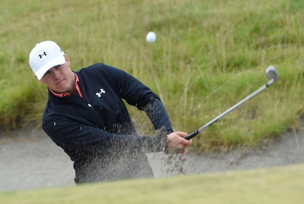 Jun 16, 2015; University Place, WA, USA; Jordan Spieth hits out of the bunker on the ninth hole during practice rounds on Tuesday at Chambers Bay. Mandatory Credit: Michael Madrid-USA TODAY Sports