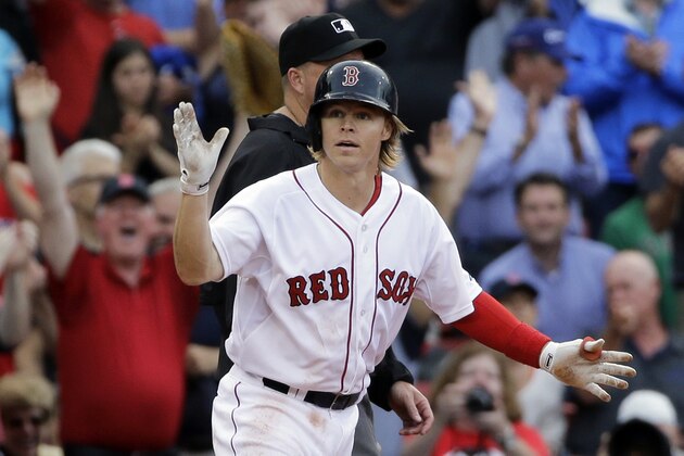 Boston Red Sox's Brock Holt claps after hitting a triple in the eighth inning of a baseball game against the Atlanta Braves at Fenway Park Tuesday, June 16, 2015, in Boston. Holt hit for the cycle (a single, double, triple and homer) in the baseball game. (AP Photo/Elise Amendola) Boston Red Sox's Brock Holt claps after hitting a triple in the eighth inning of a baseball game against the Atlanta Braves at Fenway Park Tuesday, June 16, 2015, in Boston. Holt hit for the cycle (a single, double, triple and homer) in the baseball game. (AP Photo/Elise Amendola)