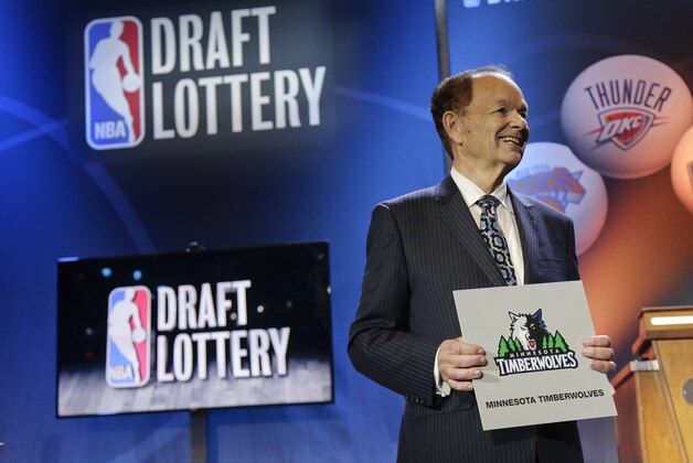 Minnesota Timberwolves owner Glen Miller poses for photos after the Timberwolves won the No. 1 pick in the NBA basketball draft lottery Tuesday, May 19, 2015, in New York. (AP Photo/Julie Jacobson)