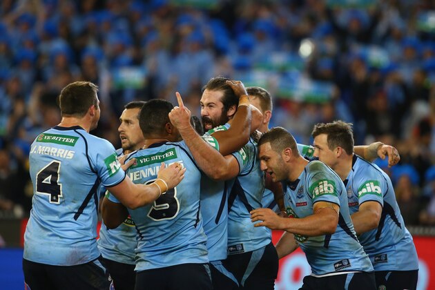 MELBOURNE, AUSTRALIA - JUNE 17:  James Tamou of the Blues celebrates with team mates after scoring a try during game two of the State of Origin series between the New South Wales Blues and the Queensland Maroons at the Melbourne Cricket Ground on June 17, 2015 in Melbourne, Australia.  (Photo by Robert Cianflone/Getty Images)