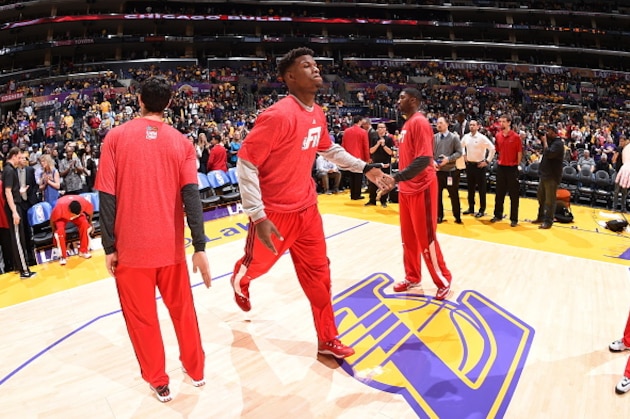 LOS ANGELES, CA - JANUARY 29: Jimmy Butler #21 of the Chicago Bulls gets introduced before a game against the Los Angeles Lakers at STAPLES Center on January 29, 2015 in Los Angeles, California. NOTE TO USER: User expressly acknowledges and agrees that, by downloading and/or using this Photograph, user is consenting to the terms and conditions of the Getty Images License Agreement. Mandatory Copyright Notice: Copyright 2015 NBAE (Photo by Andrew D. Bernstein/NBAE via Getty Images)