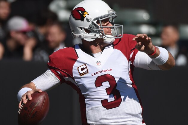 October 19, 2014; Oakland, CA, USA; Arizona Cardinals quarterback Carson Palmer (3) warms up before the game against the Oakland Raiders at O.co Coliseum. The Cardinals defeated the Raiders 24-13. Mandatory Credit: Kyle Terada-USA TODAY Sports