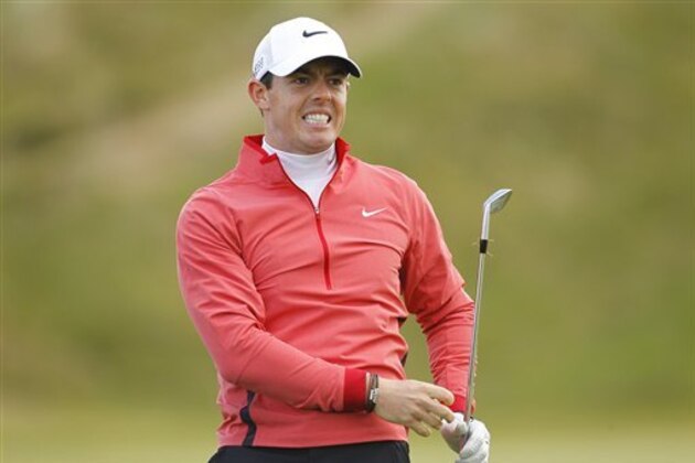 Northern Ireland's Rory McIlroy after playing his second shot on hole 9 during round one of the Irish Open Golf Championship at Royal County Down, Newcastle, Northern Ireland, Thursday, May 28, 2015.  (AP Photo/Peter Morrison)