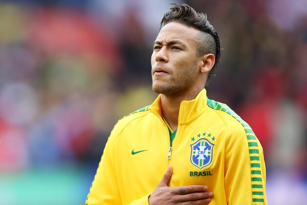 LONDON, ENGLAND - MARCH 29:  Neymar of Brazil sings the national anthem prior to kickoff during the international friendly match between Brazil and Chile at the Emirates Stadium on March 29, 2015 in London, England.  (Photo by Paul Gilham/Getty Images)