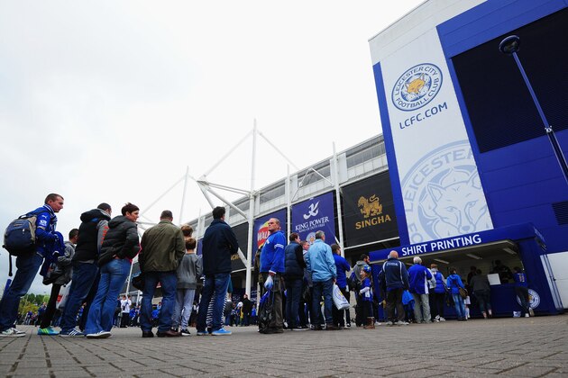 LEICESTER, ENGLAND - MAY 24:  Leicester City fans queue for the shirt printing prior to the Barclays Premier League match between Leicester City and Queens Park Rangers at The King Power Stadium on May 24, 2015 in Leicester, England.  (Photo by Dan Mullan/Getty Images)
