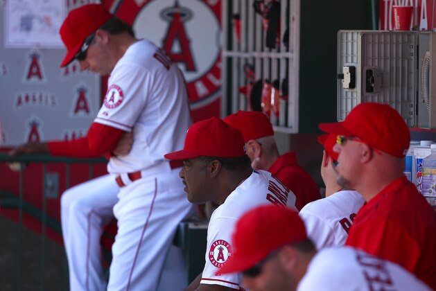 ANAHEIM, CA - JUNE 14: Hitting Coach Don Baylor of the Los Angeles Angels of Anaheim and his team look on from the dugout during the MLB game against the Oakland Athletics at Angel Stadium of Anaheim on June 14, 2015 in Anaheim, California. The Athletics defeaed the Angels 8-1. (Photo by Victor Decolongon/Getty Images)