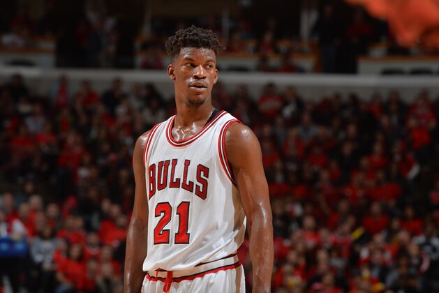 CHICAGO,IL :  Jimmy Butler #21 of the Chicago Bulls looks on against the Cleveland Cavaliers at the United Center During Game Four of the Eastern Conference Semifinals during the 2015 NBA Playoffs on May 10, 2015 in Chicago,Illinois NOTE TO USER: User expressly acknowledges and agrees that, by downloading and/or using this Photograph, user is consenting to the terms and conditions of the Getty Images License Agreement. Mandatory Copyright Notice: Copyright 2015 NBAE (Photo by Jesse D. Garrabrant/NBAE via Getty Images)
