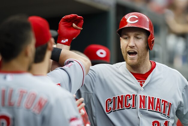 Jun 16, 2015; Detroit, MI, USA; Cincinnati Reds third baseman Todd Frazier (21) receives congratulations from teammates after he hits a home run in the fifth inning against the Detroit Tigers at Comerica Park. Mandatory Credit: Rick Osentoski-USA TODAY Sports