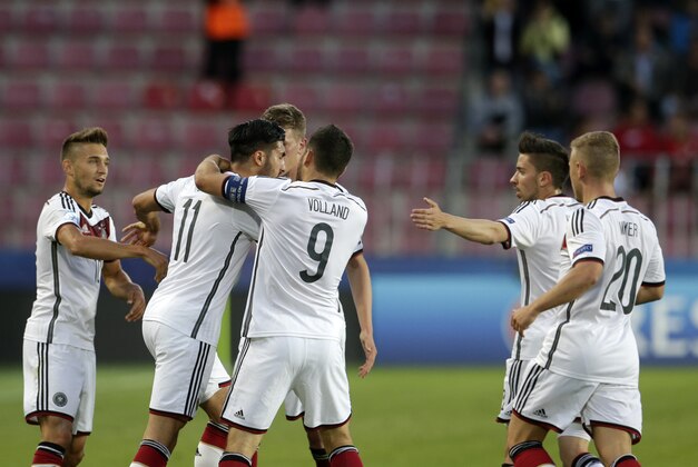 Germany’s Emre Can, 11, celebrates with teammates after scoring a goal during their Euro U21 soccer championship group A match between Germany and Serbia, in Prague, Czech Republic, Wednesday, June 17, 2015. (AP Photo/Petr David Josek)