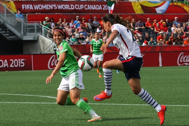 OTTAWA, ON - JUNE 17: Kenti Robles #2 of Mexico defends against Amel Majri #22 of France during the FIFA Women's World Cup Canada 2015 Group F match between Mexico and France at Lansdowne Stadium on June 17, 2015 in Ottawa, Canada.  (Photo by Andre Ringuette/Getty Images)