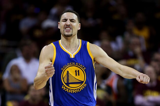 CLEVELAND, OH - JUNE 16:  Klay Thompson #11 of the Golden State Warriors celebrates a three pointer in the fourth quarter against the Cleveland Cavaliers during Game Six of the 2015 NBA Finals at Quicken Loans Arena on June 16, 2015 in Cleveland, Ohio. NOTE TO USER: User expressly acknowledges and agrees that, by downloading and or using this photograph, user is consenting to the terms and conditions of Getty Images License Agreement.  (Photo by Ezra Shaw/Getty Images)