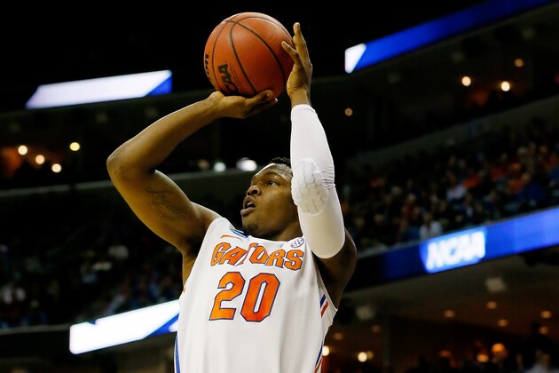 MEMPHIS, TN - MARCH 27:  Michael Frazier II #20 of the Florida Gators takes a shot against the UCLA Bruins during a regional semifinal of the 2014 NCAA Men's Basketball Tournament at the FedExForum on March 27, 2014 in Memphis, Tennessee.  (Photo by Kevin C. Cox/Getty Images)