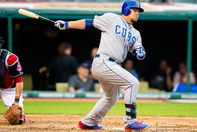 CLEVELAND, OH -  JUNE 17: Kyle Schwarber #12 of the Chicago Cubs hits an RBI single during the third inning against the Cleveland Indians at Progressive Field on June 17, 2015 in Cleveland, Ohio.  (Photo by Jason Miller/Getty Images)