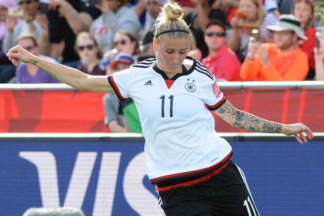 Jun 7, 2015; Ottawa, Ontario, CAN; Germany forward Anja Mittag (11) kicks against Ivory Coast in the second half of a Group B soccer match in the 2015 women's World Cup at Lansdowne Stadium. Mandatory Credit: Marc DesRosiers-USA TODAY Sports