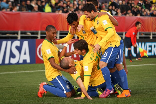 CHRISTCHURCH, NEW ZEALAND - JUNE 17:  Marcos Guilherme of Brazil celebrates with his team mates after scoring a goal during the FIFA U-20 World Cup Semi Final match between Brazil and Senegal at Christchurch Stadium on June 17, 2015 in Christchurch, New Zealand.  (Photo by Martin Hunter/Getty Images)