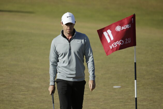 Rory McIlroy, of Northern Ireland, walks off the 11th green 1during a practice round for the U.S. Open golf tournament at Chambers Bay on Wednesday, June 17, 2015 in University Place, Wash. (AP Photo/Charlie Riedel)