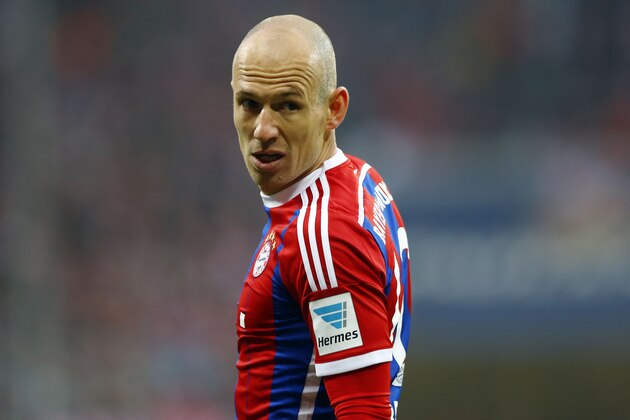 Bayern's Arjen Robben from the Netherlands watches the ball during the German first division Bundesliga soccer match between FC Bayern Munich and Borussia Moenchengladbach in the Allianz Arena in Munich, Germany, on Sunday, March 22, 2015. (AP Photo/Matthias Schrader)