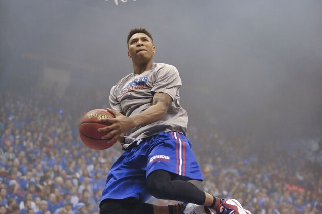 Oct 10, 2014; Kansas, MO, USA; Kansas Jayhawks guard Kelly Oubre (12) warms up before the scrimmage during Late Night at the Phog at Allen Fieldhouse. Mandatory Credit: Denny Medley-USA TODAY Sports