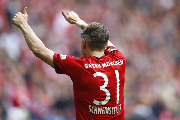 Bayern's Bastian Schweinsteiger celebrates after scoring his side's second goal during the German first division Bundesliga soccer match between FC Bayern Munich and 1. FSV Mainz 05 at the Allianz Arena in Munich, Germany, on Saturday, May 23, 2015. (AP Photo/Matthias Schrader)