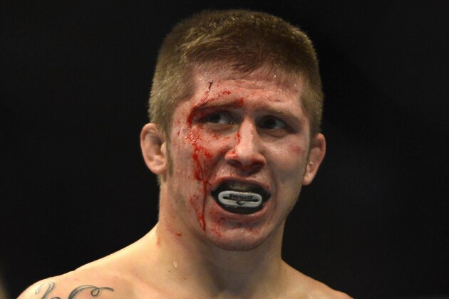 Justin Lawrence looks on during a featherweight bout against Max Holloway at UFC 150in Denver, Saturday, Aug. 11, 2012. Holloway won the bout by TKO in the second round. (AP Photo/Jack Dempsey)