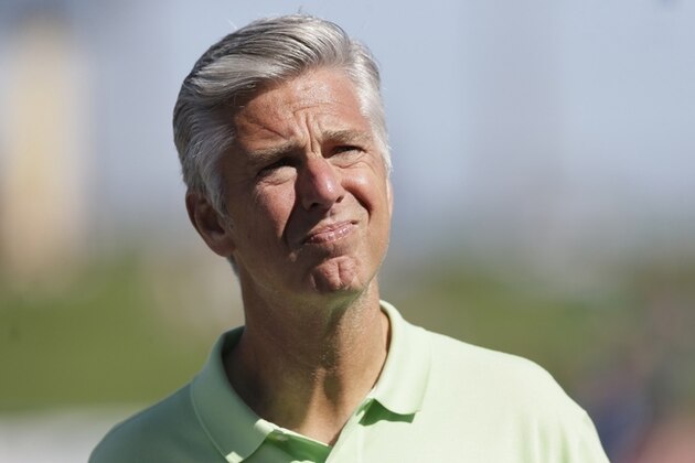 David Dombrowski, president, CEO, and general manager of the Detroit Tigers is seen before a spring training exhibition baseball game between the Detroit Tigers and the Washington Nationals in Lakeland, Fla., Tuesday, March 17, 2015. (AP Photo/Carlos Osorio)