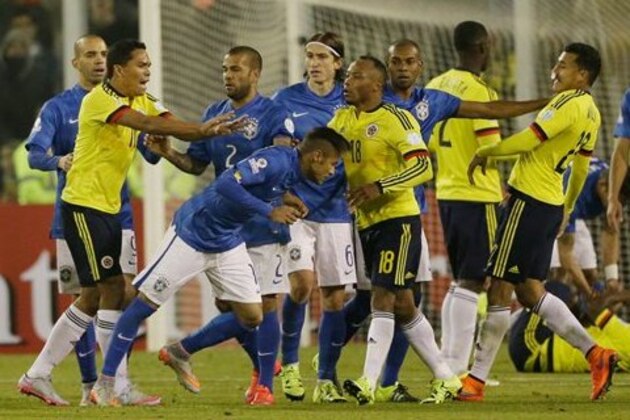 Colombia's Carlos Bacca, second left, pushes Brazil's Neymar, center right, at the end of the Copa America Group C soccer match at the Monumental stadium in Santiago, Chile, Wednesday, June 17, 2015. Colombia  won the match 1-0 and Bacca and Neymar where both sent off with a red card at the end of the match. (AP Photo/Ricardo Mazalan)