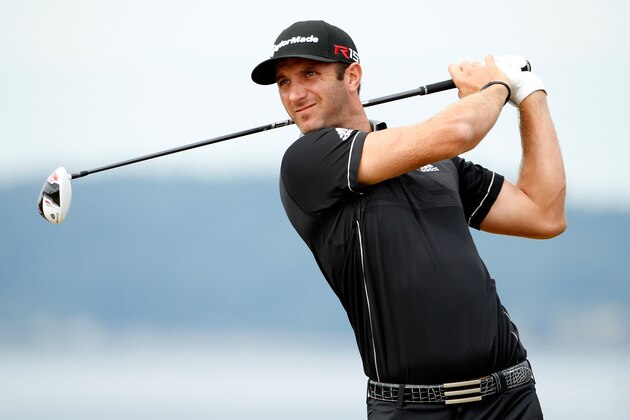 UNIVERSITY PLACE, WA - JUNE 18:  Dustin Johnson of the United States watches his tee shot on the 18th hole during the first round of the 115th U.S. Open Championship at Chambers Bay on June 18, 2015 in University Place, Washington.  (Photo by Ezra Shaw/Getty Images)