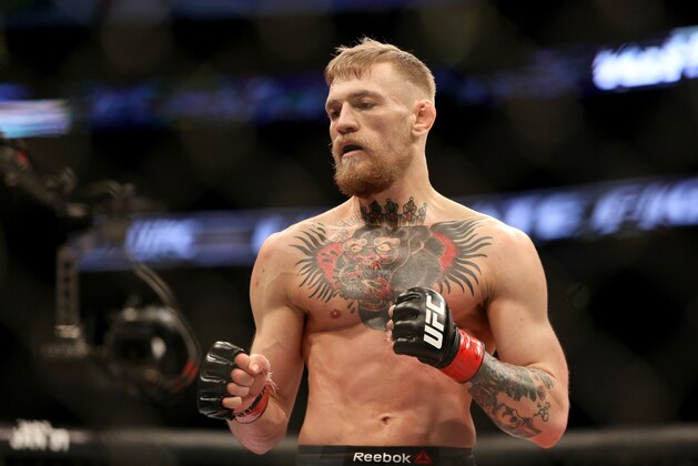 Conor McGregor in action against Denis Siver, during their featherweight fight at UFC Fight Night, Sunday, January 18, 2015 in Boston.  McGregor won via 2nd round TKO. (AP Photo/Gregory Payan)