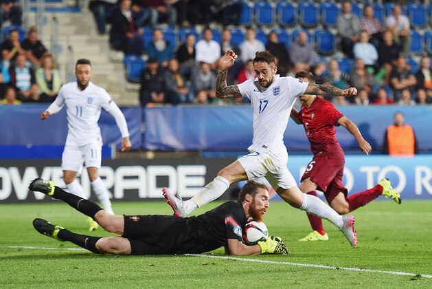 UHERSKE HRADISTE, CZECH REPUBLIC - JUNE 18: Jose Sa of Portugal claims the ball under pressure from Danny Ings during the UEFA Under21 European Championship 2015 Group B match between England and Portugal at Mestsky Fotbalovy Stadium on June 18, 2015 in Uherske Hradiste, Czech Republic.  (Photo by Michael Regan/Getty Images)