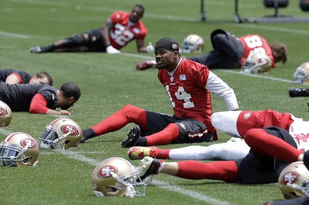San Francisco 49ers wide receiver Jerome Simpson stretches during practice at an NFL football facility in Santa Clara, Calif., Friday, May 29, 2015. (AP Photo/Jeff Chiu)