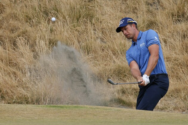 Henrik Stenson, of Sweden, hits out of the bunker on the sixth hole during the first round of the U.S. Open golf tournament at Chambers Bay on Thursday, June 18, 2015 in University Place, Wash. (AP Photo/Matt York)